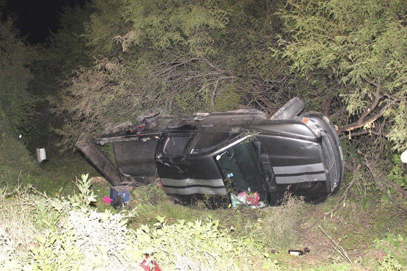 Scene of Dodge Ram rolled over in a ditch